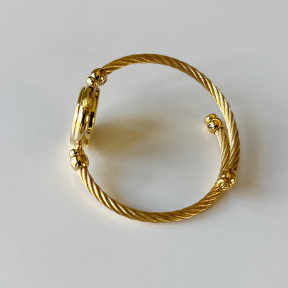Gucci 1990s Black Round Dial Cable Gold-Plated Bangle Watch