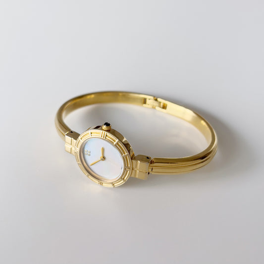 Yves Saint Laurent 1990s Seashell Dial Gold Plated Bangle Watch