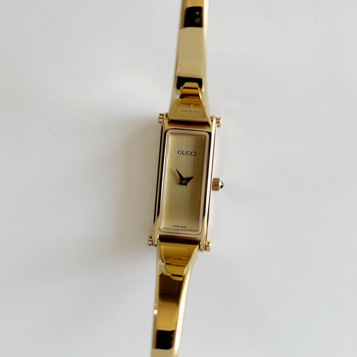 Gucci 1990s Rectangular Dial Gold Plated Bangle Watch