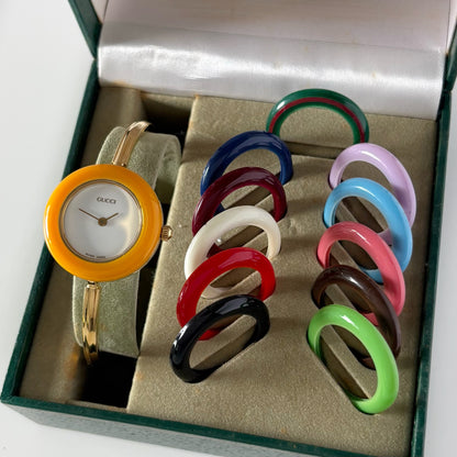 Gucci 1990s Interchangeable Bezel Gold Plated Bangle Watch with 12 bezels, case