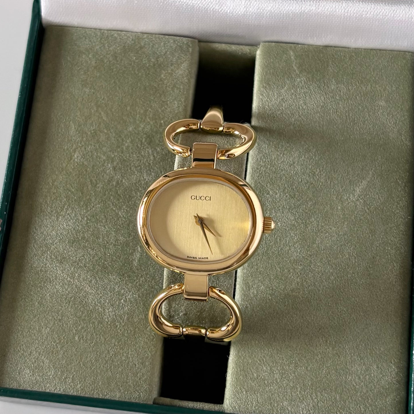 Gucci 1990s Oval Gold Dial Gold Plated Bangle Watch (Small)