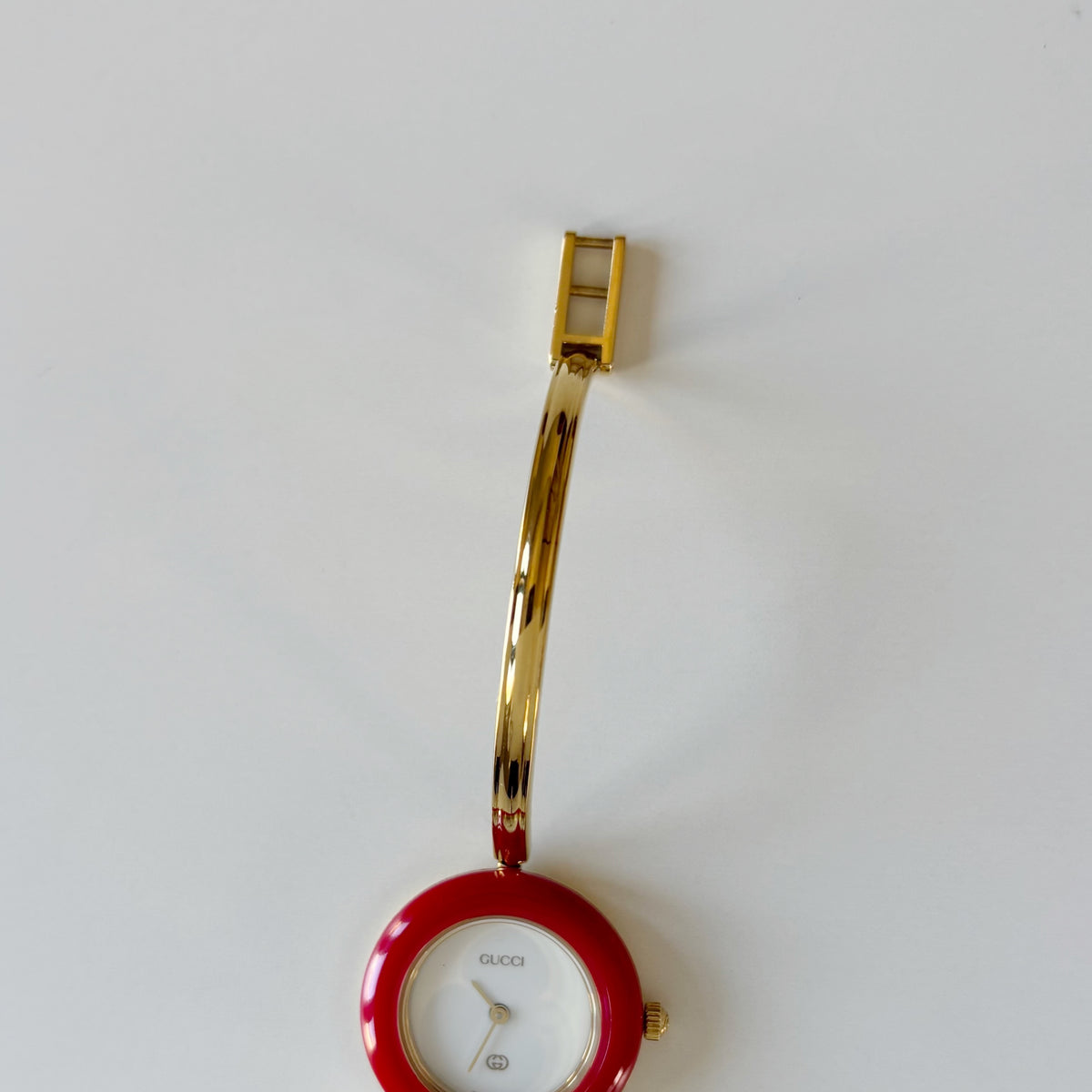 Gucci 1990s Interchangeable Bezel Gold Plated Bangle Watch with 12 bezels, case