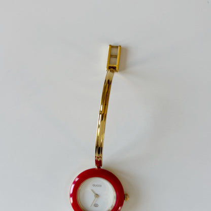 Gucci 1990s Interchangeable Bezel Gold Plated Bangle Watch with 12 bezels, case