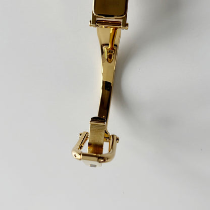Gucci 1990s Gold Rectangular Dial Gold Plated Bangle Watch