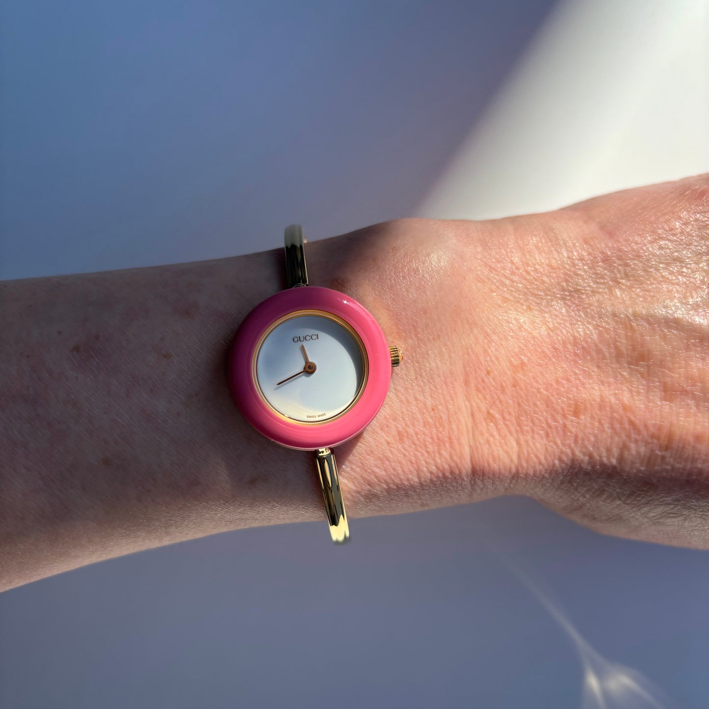 Gucci 1990s Interchangeable Bezel Gold Plated Bangle Watch with 12 bezels, case