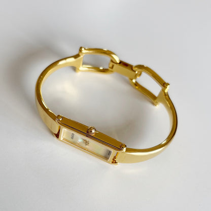 Gucci 1990s Rectangular Seashell Dial Gold Plated Bangle Watch
