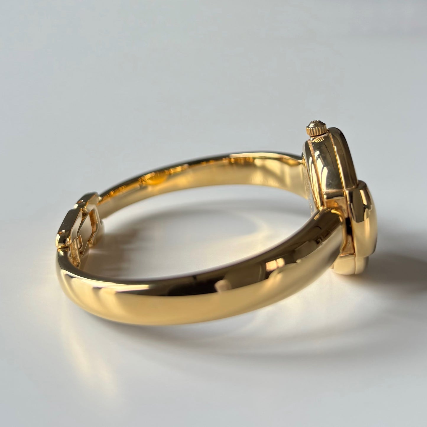Gucci 1990s Round Dial Gold Plated Bangle Watch