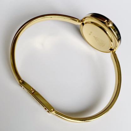 Gucci 1990s Interchangeable Bezel Gold Plated Bangle Watch with 12 bezels, case