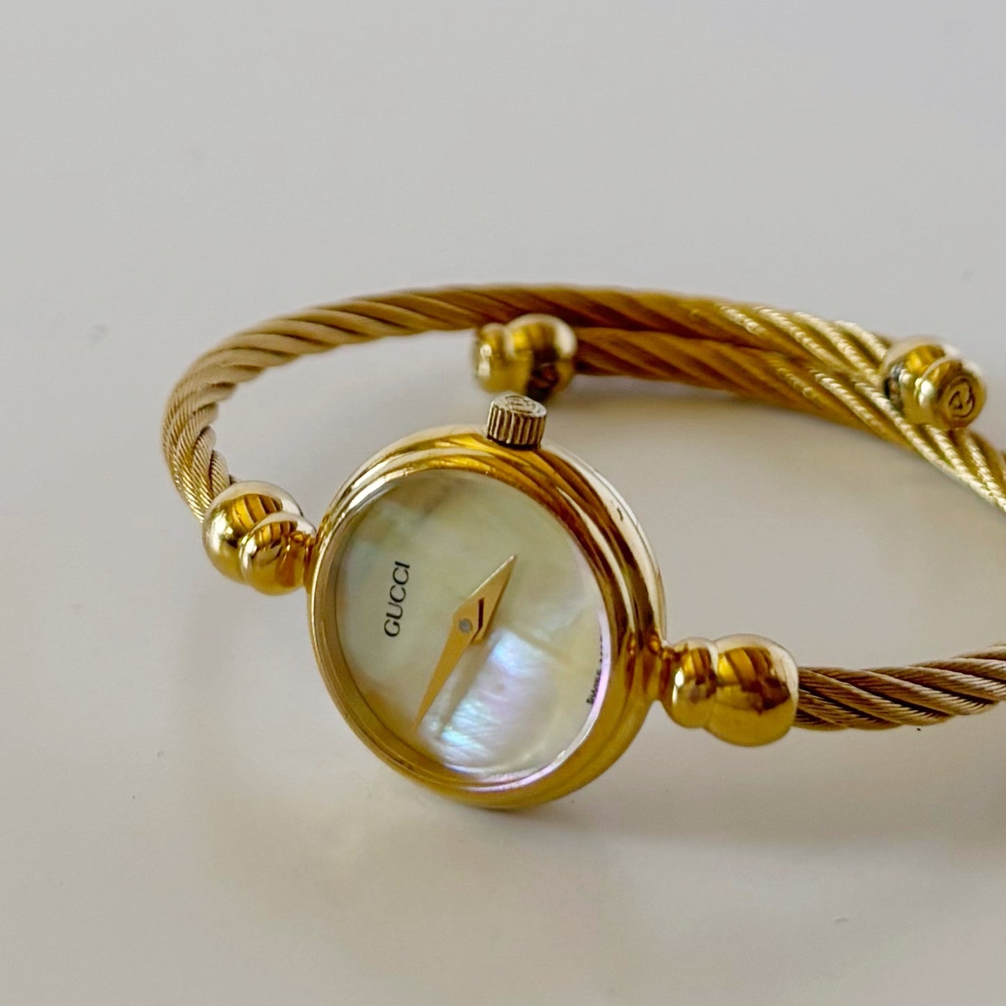 Gucci 1990s Seashell Dial Gold Plated Cable Bangle Watch