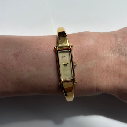 Gucci 1990s Seashell Rectangular Dial Gold Plated Bangle Watch