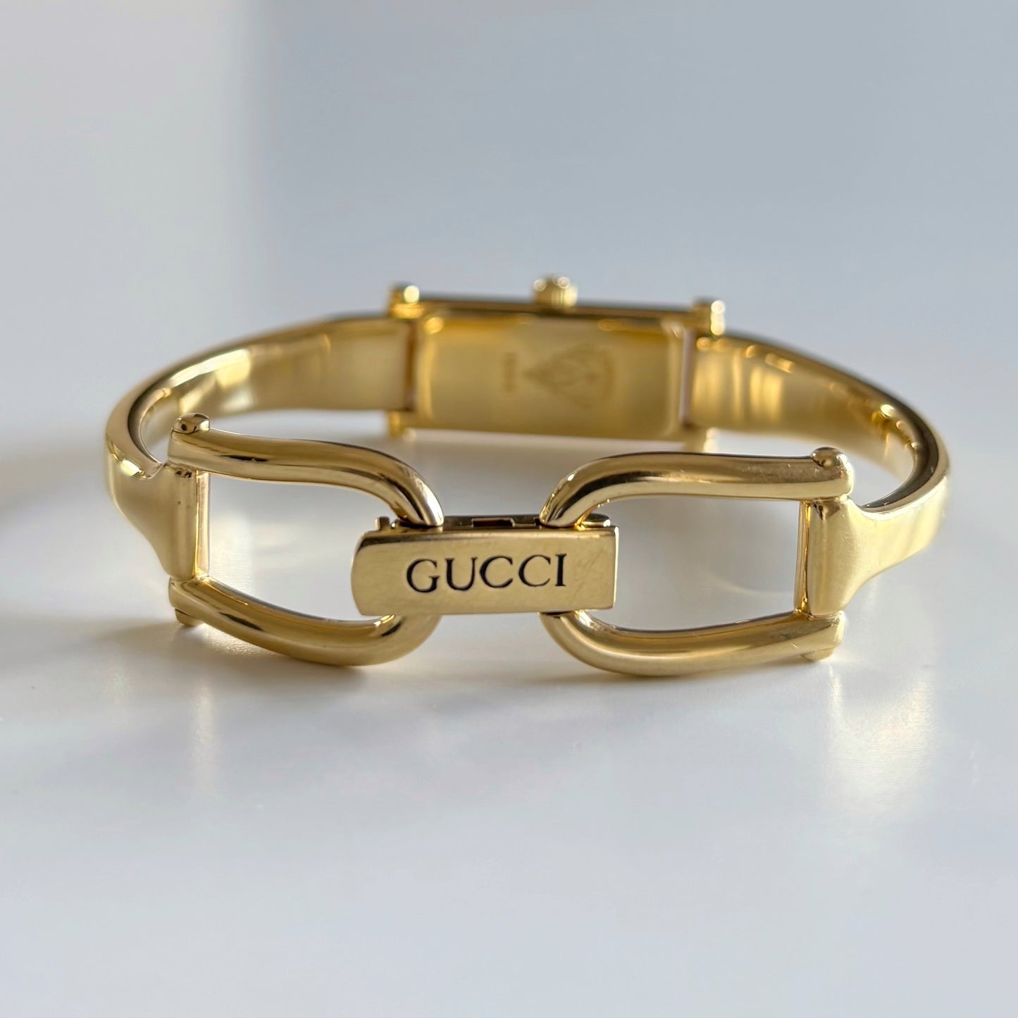 Gucci 1980s Rectangular Gold Dial Gold Plated Bangle Watch