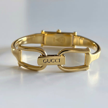 Gucci 1980s Rectangular Gold Dial Gold Plated Bangle Watch