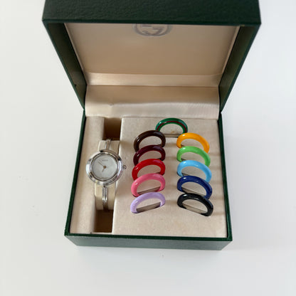 Gucci 1990s Interchangeable Bezel Stainless steel Bangle Watch with 12 bezels, case (Small)