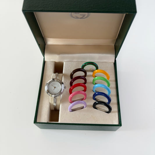 Gucci 1990s Interchangeable Bezel Stainless steel Bangle Watch with 12 bezels, case (Small)