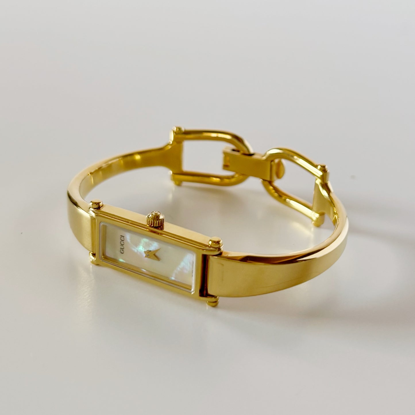 Gucci 1990s Seashell Rectangular Dial Gold Plated Bangle Watch