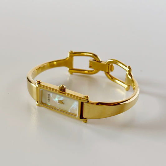 Gucci 1990s Seashell Rectangular Dial Gold Plated Bangle Watch