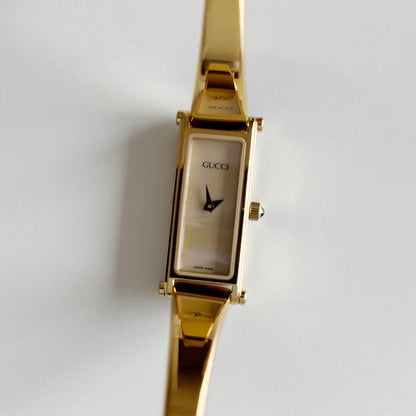 Gucci 1990s Seashell Dial Gold Plated Bangle Watch