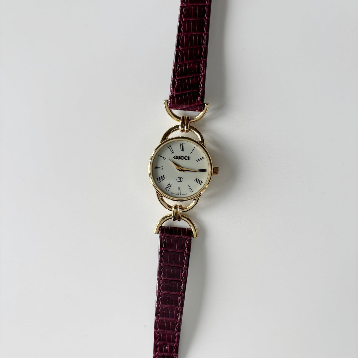 Gucci 1980s Cream Round Dial Horsebit Gold-Plated Watch