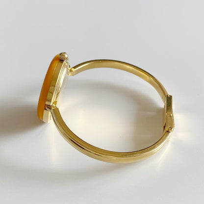 Gucci 1990s Interchangeable Bezel Gold Plated Bangle Watch with 12 bezels, case