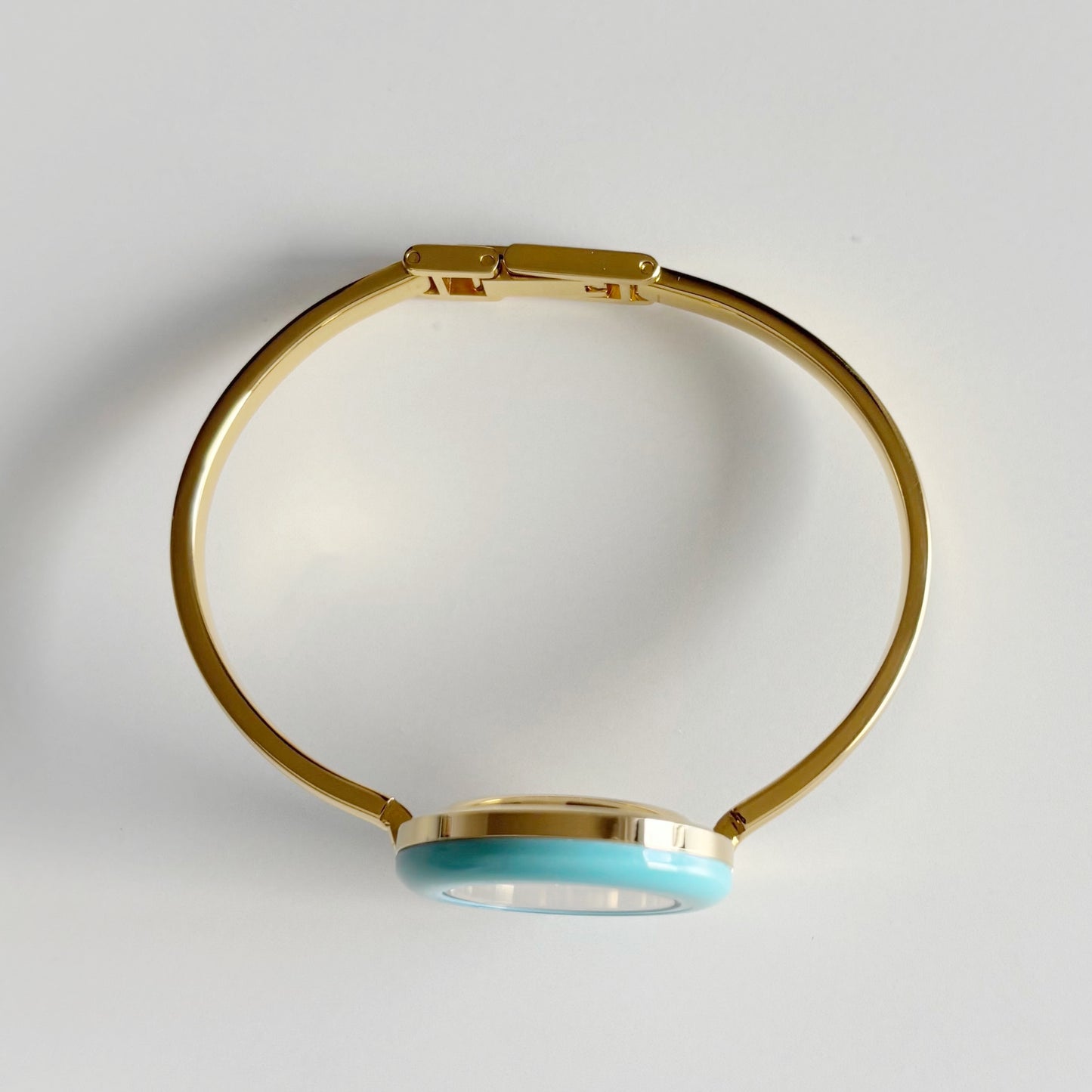 Gucci 1990s Interchangeable Bezel Gold Plated Bangle Watch with 12 bezels, case