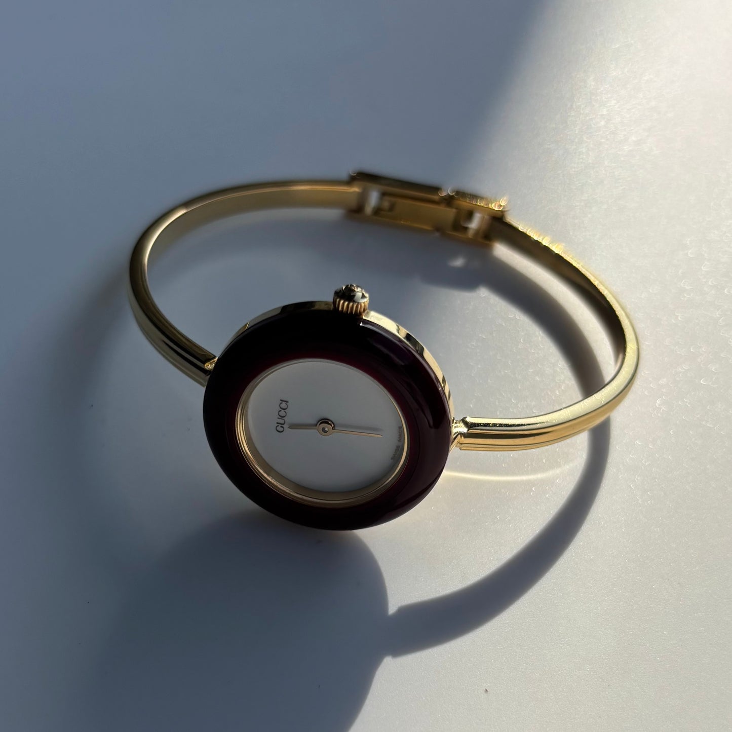 Gucci 1990s Interchangeable Bezel Gold Plated Bangle Watch with 12 bezels, case