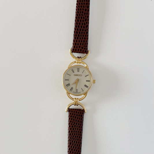 Gucci 1990s Round Cream Dial Horsebit Gold Plated Watch