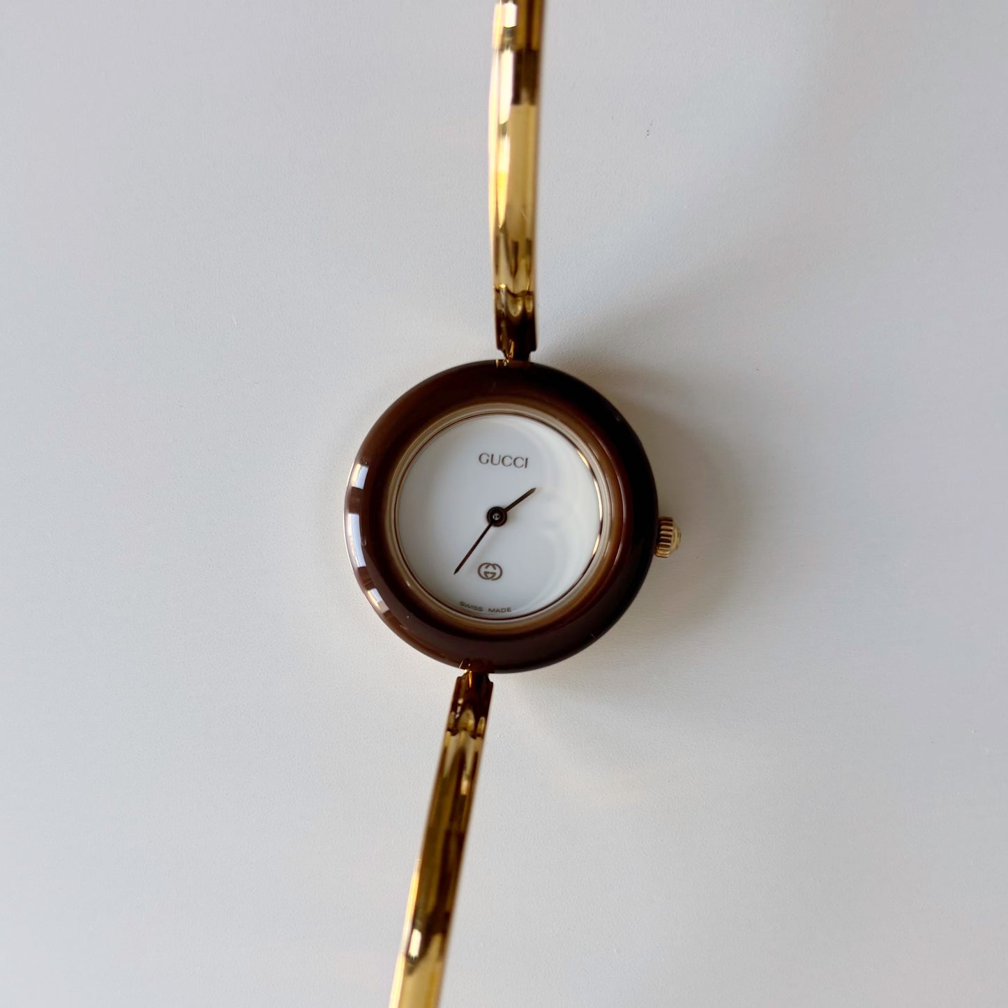 Gucci 1990s Interchangeable Bezel Gold Plated Bangle Watch with 12 bezels, case