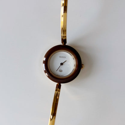 Gucci 1990s Interchangeable Bezel Gold Plated Bangle Watch with 12 bezels, case