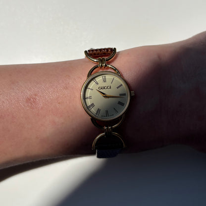 Gucci 1990s Round Cream Dial Horsebit Gold Plated Watch