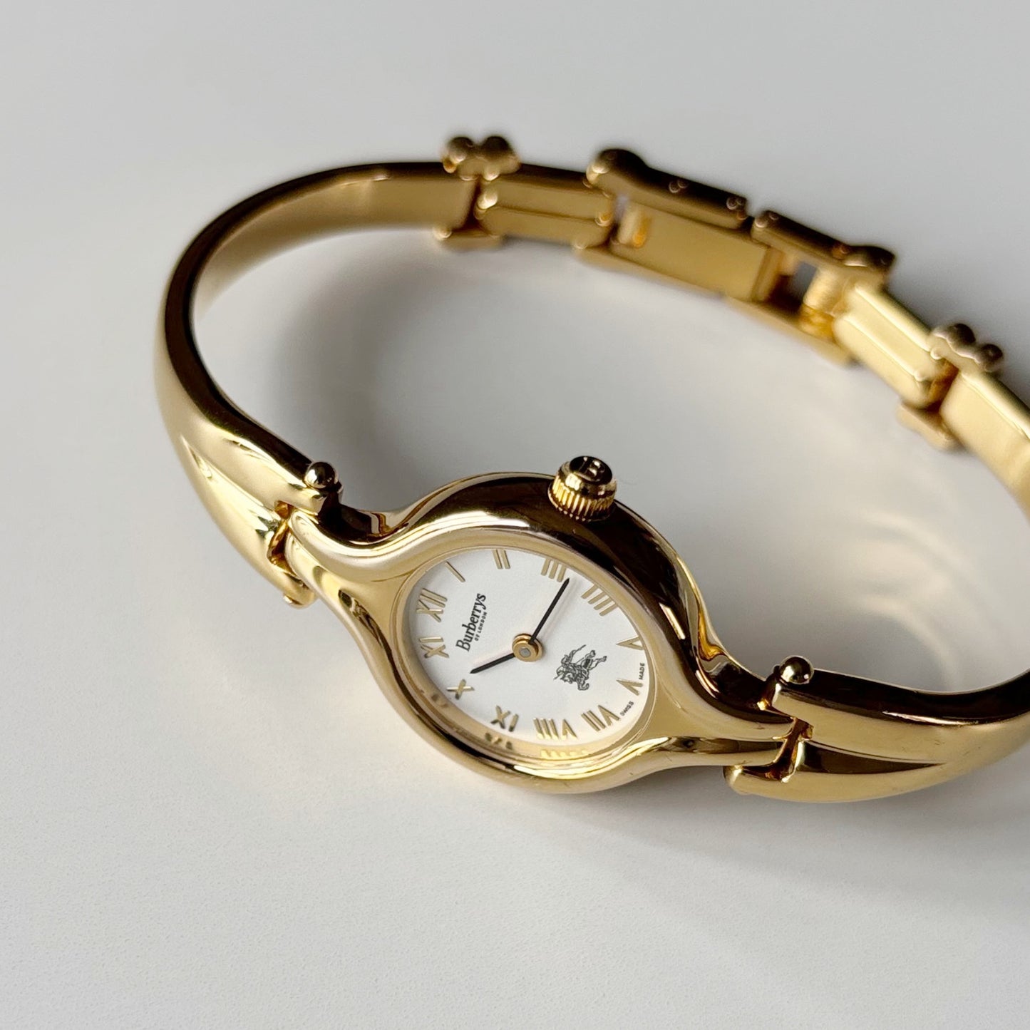 Burberry 1990s Round Dial Gold Plated Bangle Watch