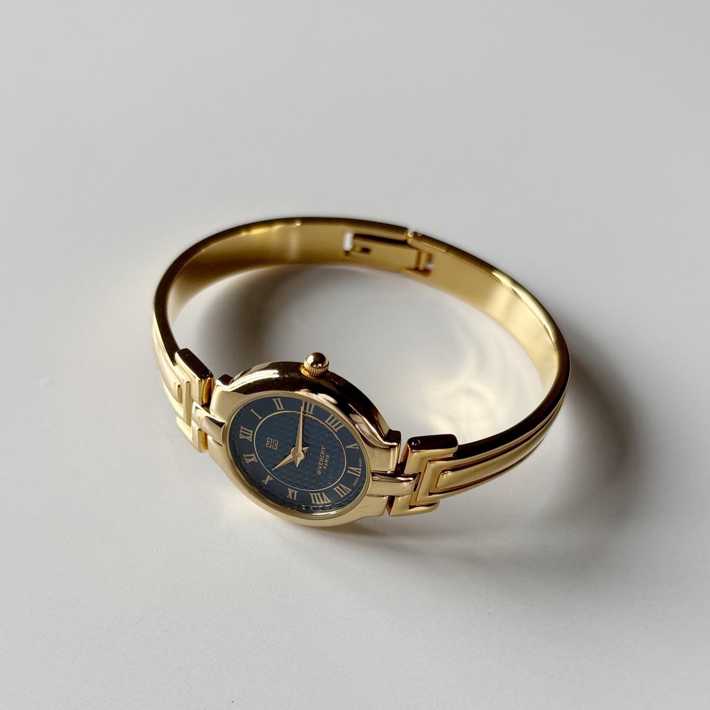Givenchy 1990s Round Dial Gold Plated Bangle Watch