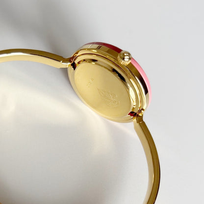 Gucci 1990s Interchangeable Bezel Gold Plated Bangle Watch with 12 bezels, case