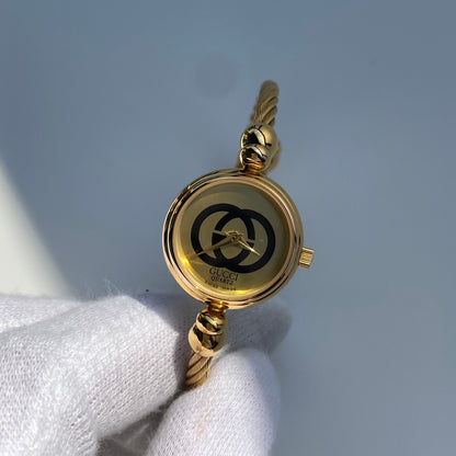Gucci 1990s Gold Plated Cable Bangle Watch