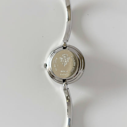 Gucci 1990s Interchangeable Bezel Stainless steel Bangle Watch with 12 bezels, case