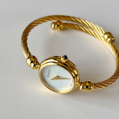 Gucci 1990s Seashell Dial Gold Plated Cable Bangle Watch
