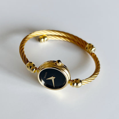 Gucci 1990s Black Dial Gold Plated Cable Band Bangle Watch