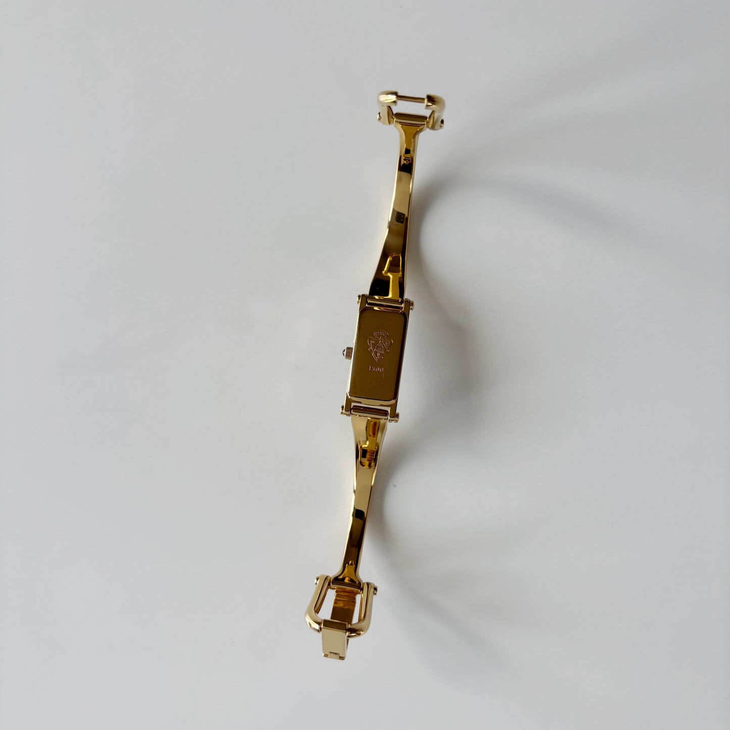 Gucci 1990s Black Rectangular Dial Gold Plated Bangle Watch