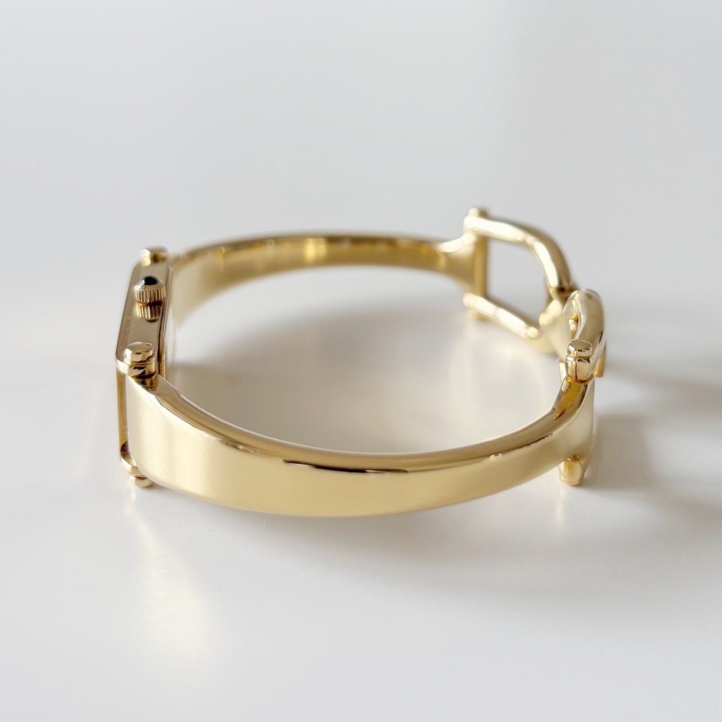 Gucci 1990s Rectangular Black Dial Gold Plated Bangle Watch