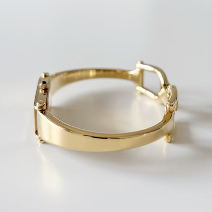 Gucci 1990s Rectangular Black Dial Gold Plated Bangle Watch
