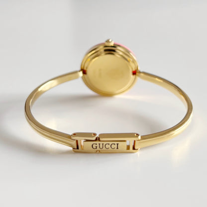 Gucci 1990s Interchangeable Bezel Gold Plated Bangle Watch with 12 bezels, case