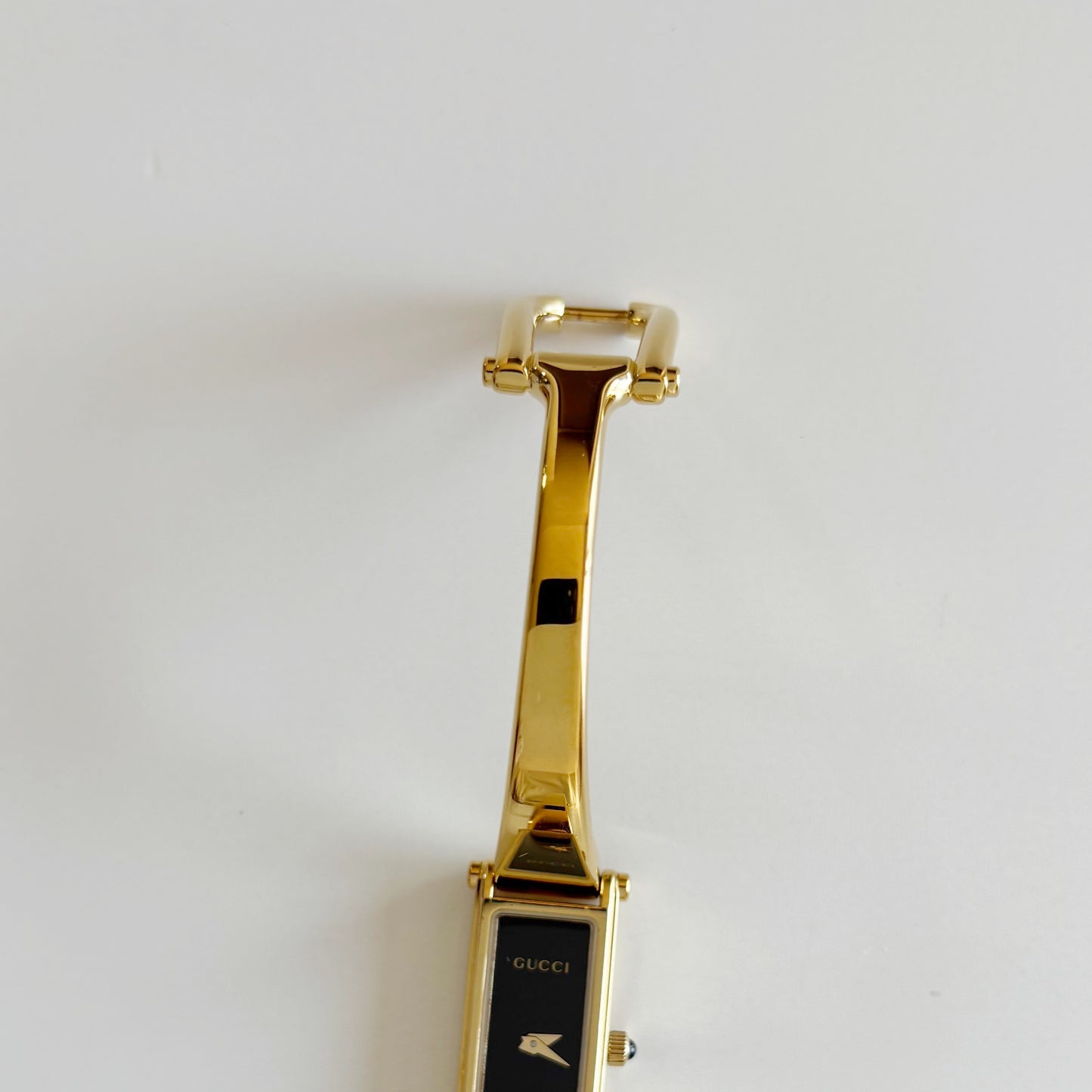 Gucci 1990s Black Dial Gold Plated Bangle Watch
