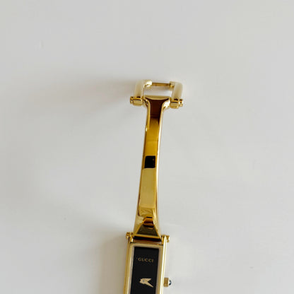 Gucci 1990s Black Dial Gold Plated Bangle Watch