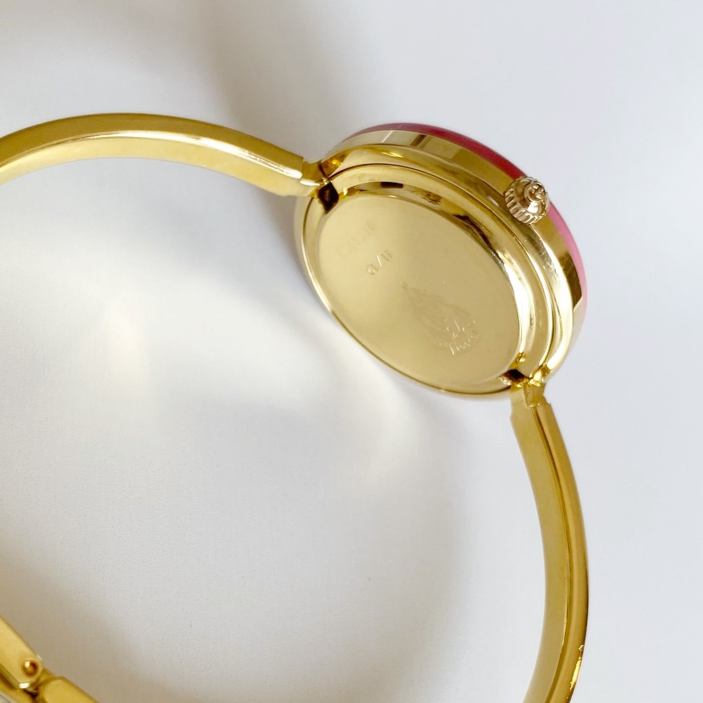 Gucci 1990s Interchangeable Bezel Gold Plated Bangle Watch with 12 bezels, case