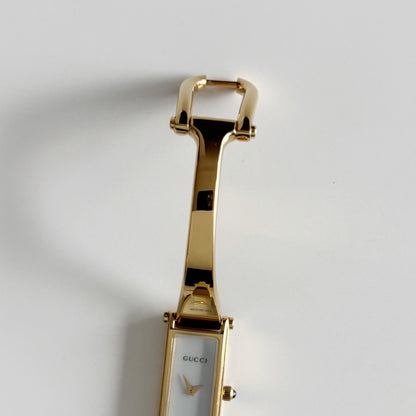 Gucci 1990s Seashell Rectangular Dial Gold Plated Bangle Watch (Small)