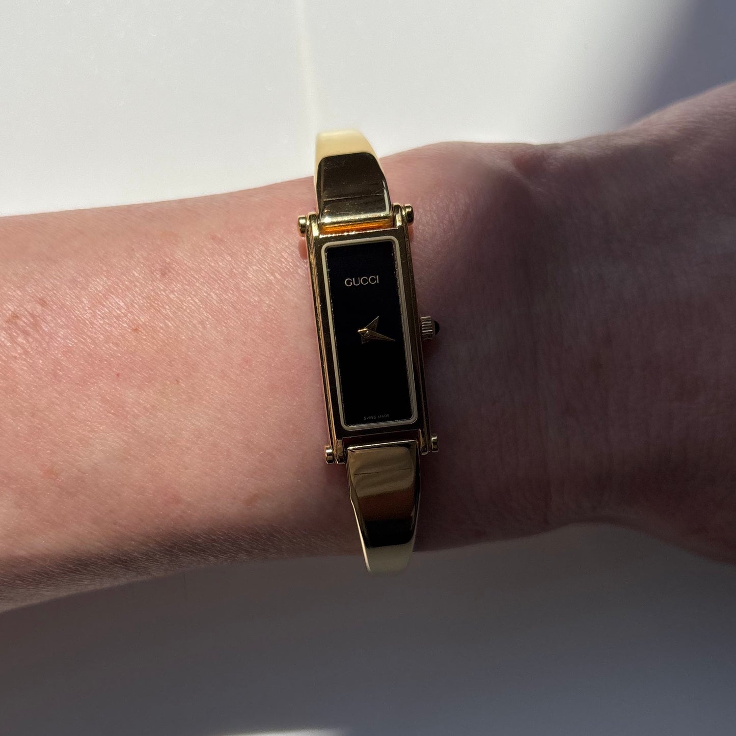 Gucci 1990s Black Dial Gold Plated Bangle Watch