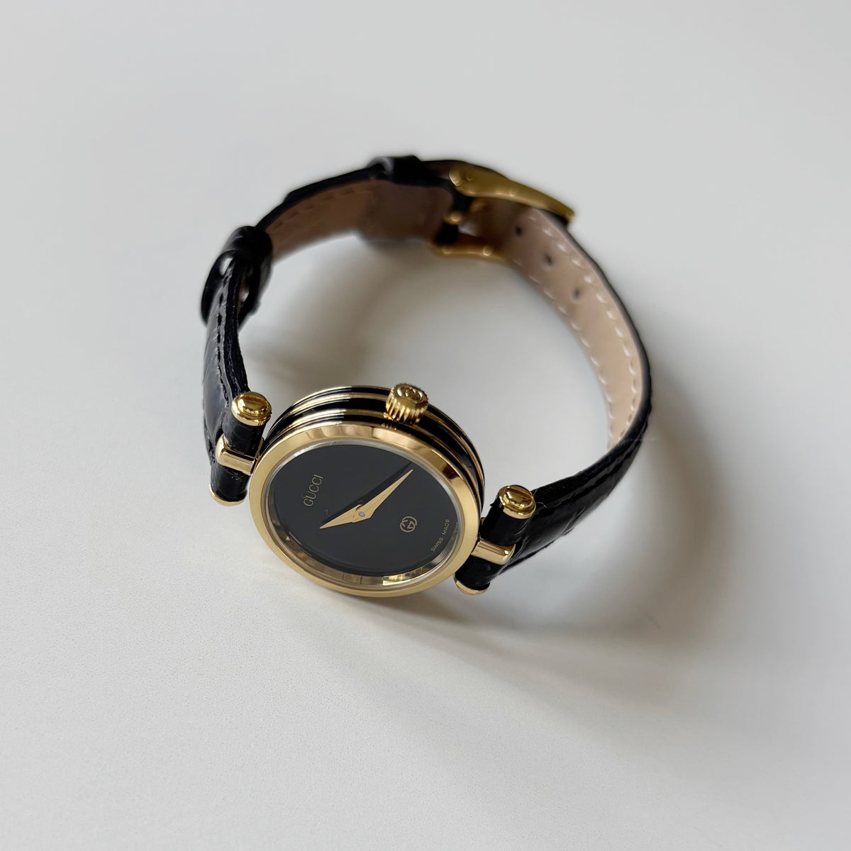 Gucci 1980s Black Dial Round Gold-Plated Watch