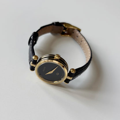 Gucci 1980s Black Dial Round Gold-Plated Watch