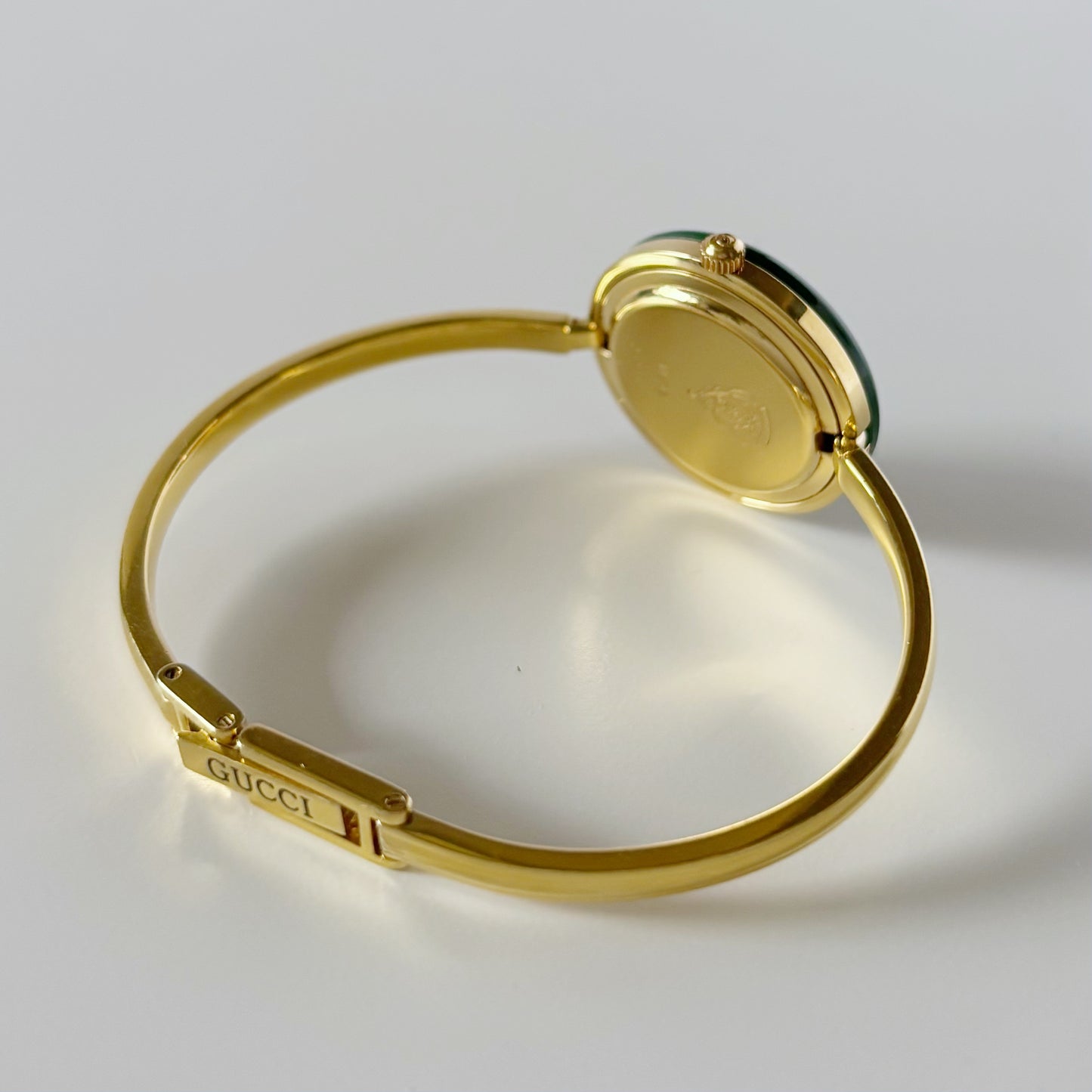 Gucci 1990s Interchangeable Bezel Gold Plated Bangle Watch with 12 bezels, case