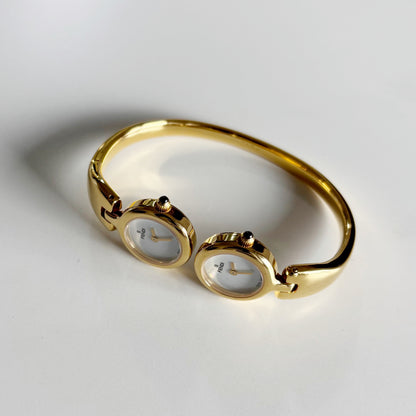 Fendi 1990s Seashell Dial Two Time Zone Gold Plated Bangle Watch