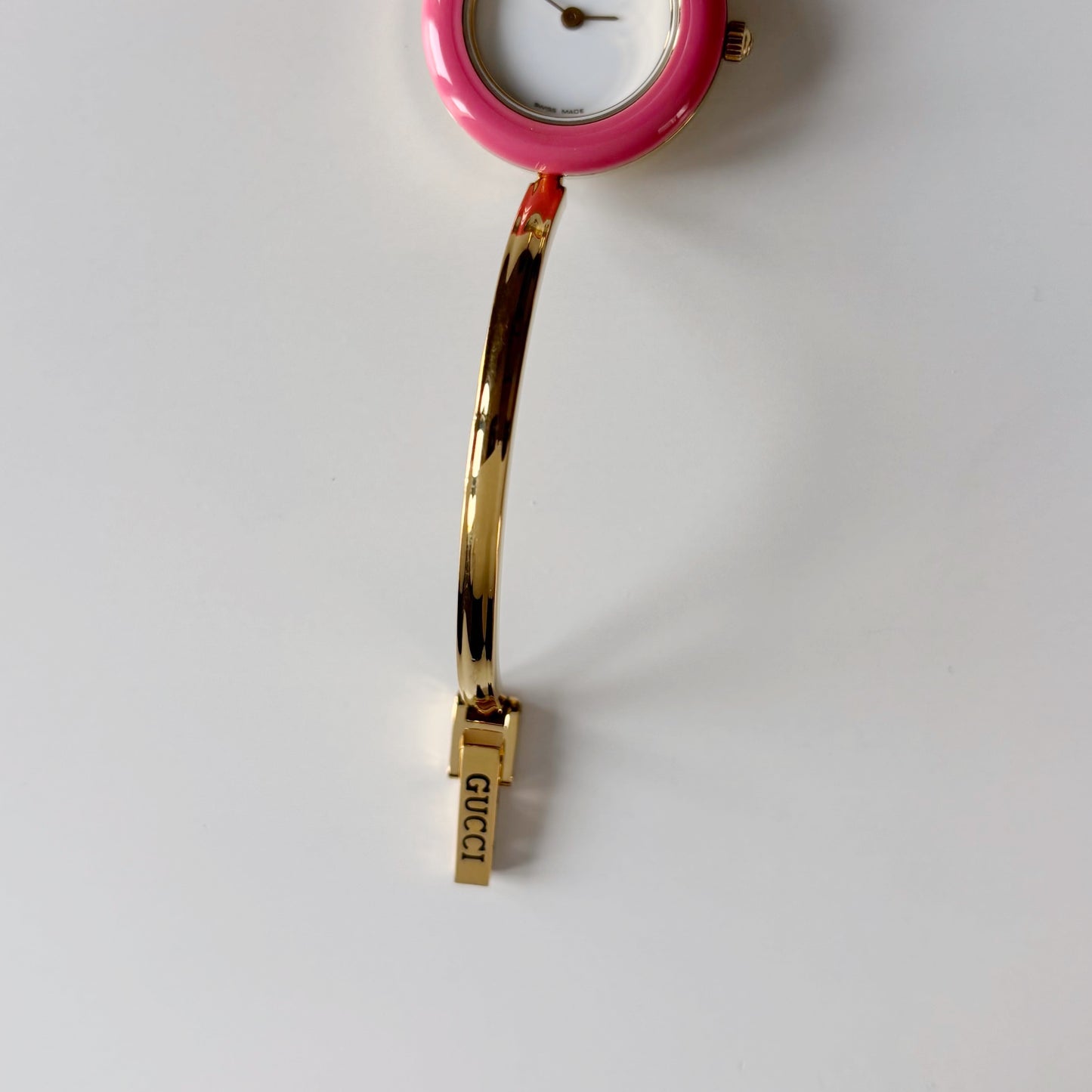 Gucci 1990s Interchangeable Bezel Gold Plated Bangle Watch with case, 12 bezels
